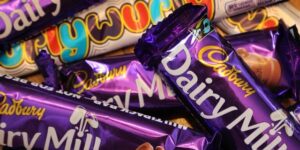 pile of cadbury dairy milk chocolate bars